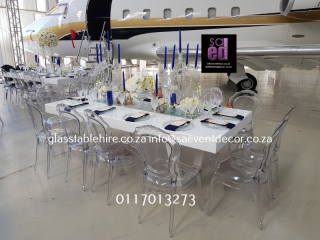 High gloss white rectangular tables. 1.2 by 2.4 meters, seats 12 guest, b
