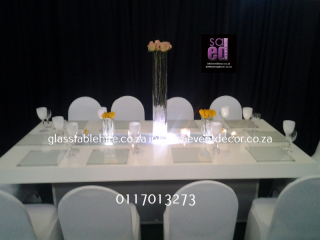 High gloss white rectangular tables. 1.2 by 2.4 meters, seats 12 guest p