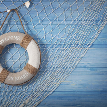 Life buoy decoration on blue shabby background